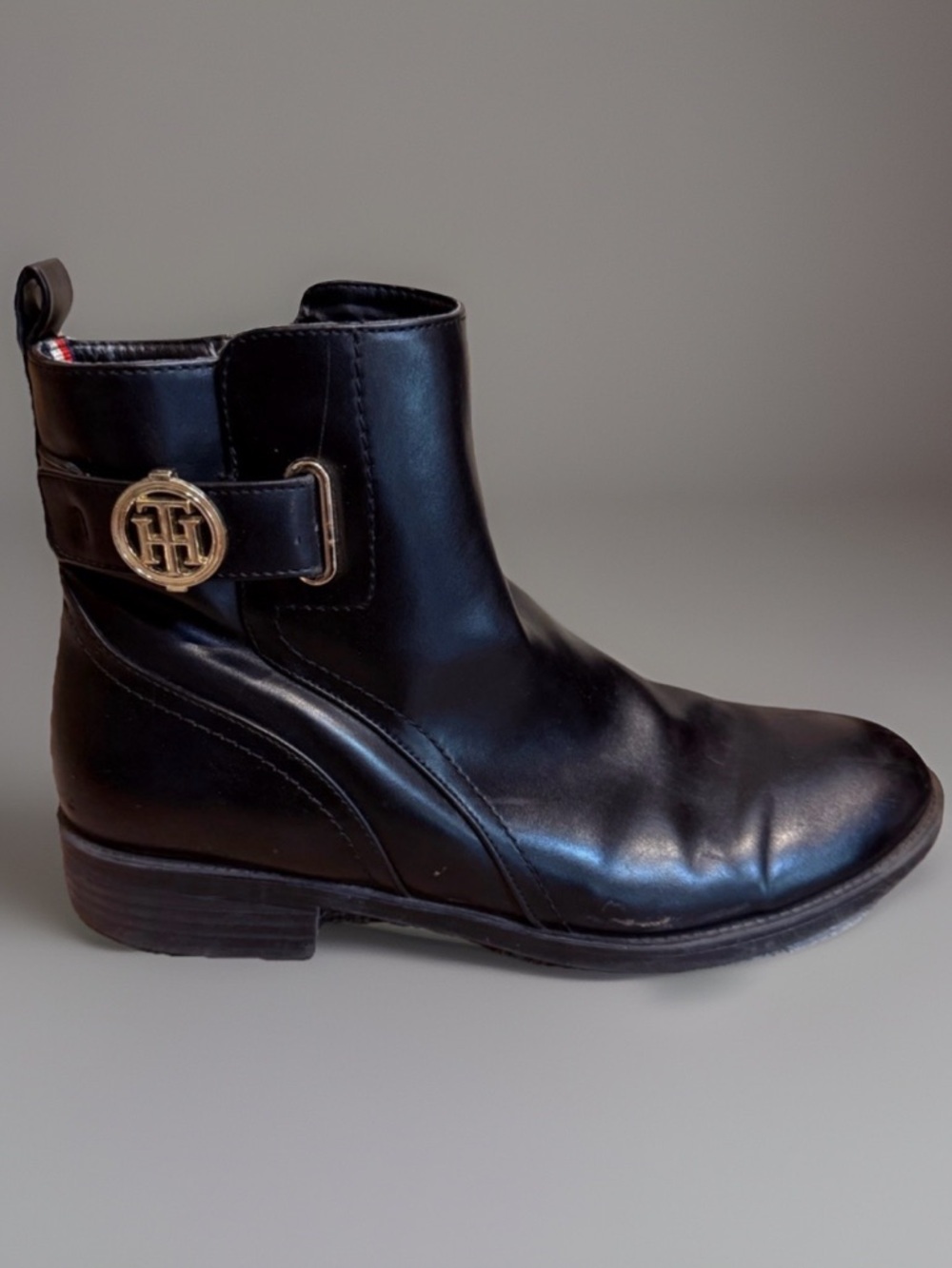 Black Leather Ankle Boots with Gold Emblem